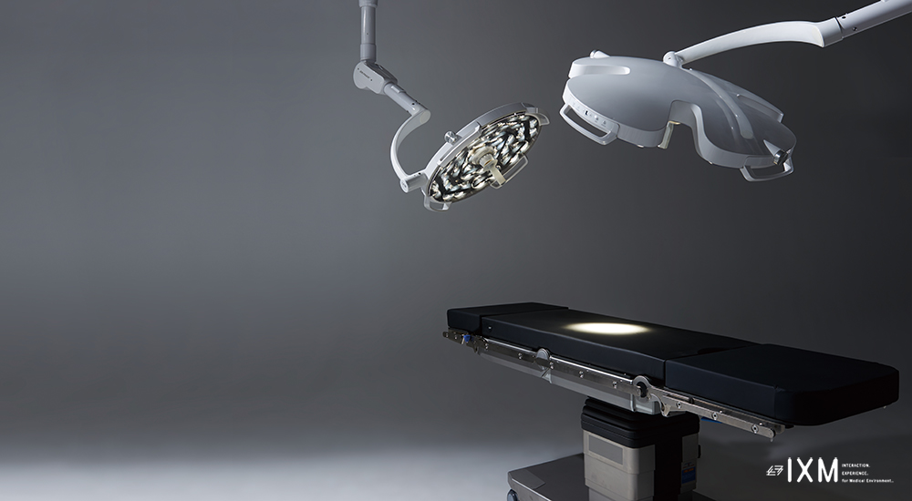 IXM CJ surgical lighting above an operating table
